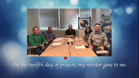 Blue background with picture of 5 people. "On the 12th day of projects my mentor gave to me."
